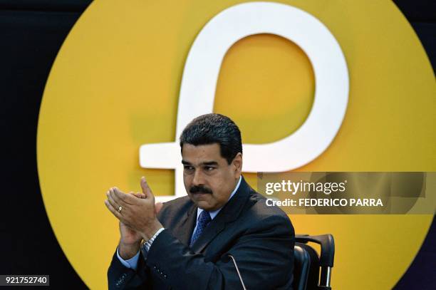 Venezuela's President Nicolas Maduro gestures during a press conference to launch to the market a new oil-backed cryptocurrency called "Petro", at...