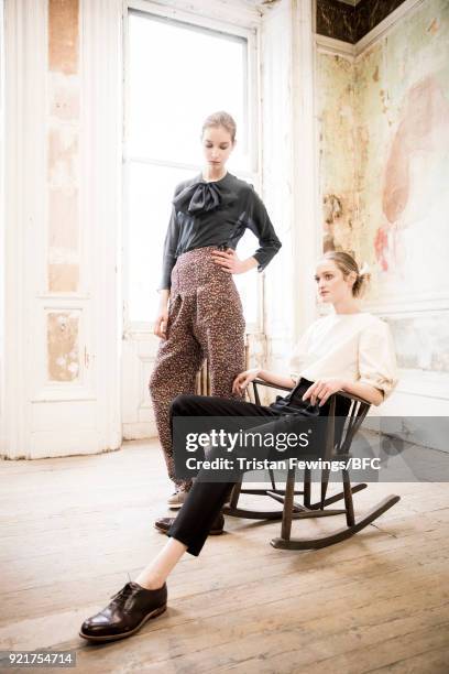 Models pose at the Merchant Archive Presentation during London Fashion Week February 2018 on February 20, 2018 in London, England.