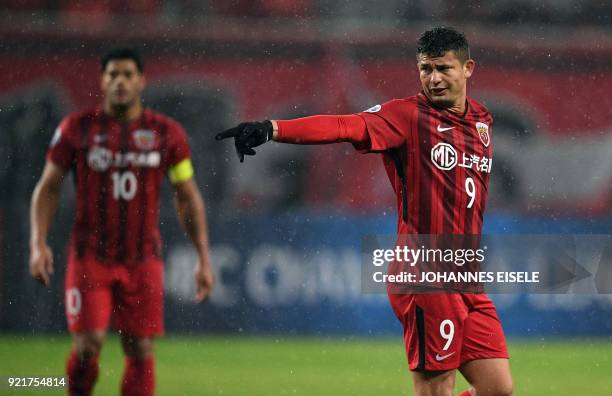 Shanghai SIPG midfielder Elkeson of Brazil reacts during the AFC Asian Champions League group F football match between the Shanghai SIPG and...