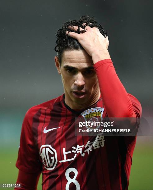 Shanghai SIPG midfielder Oscar of Brazil reacts during the AFC Asian Champions League group F football match between the Shanghai SIPG and Melbourne...