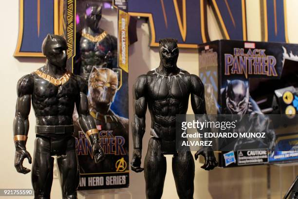 Black Panther toys are displayed to attendees at the Hasbro showroom during the annual New York Toy Fair, on February 20 in New York. Panther claws,...