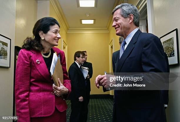 Senate Finance Chairman Max Baucus , and Sen. Olympia Snowe speak before meeting privately at the Capitol October 21, 2009 in Washington, DC. Snowe...