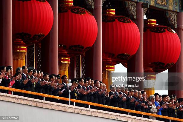 China's President Hu Jintao and other leaders review a parade to mark the 60th anniversary of the founding of the People's Republic of China on...