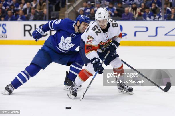 Toronto Maple Leafs defenseman Roman Polak also plays catch up as Florida Panthers center Denis Malgin gets loose and manages a backhander on Toronto...