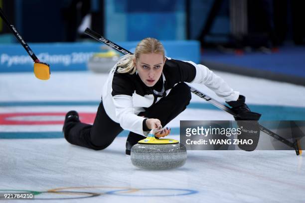 Russia's Victoria Moiseeva throws the stone during the curling women's round robin session between South Korea and the Olympic Athletes from Russia...