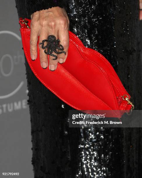 Costume designer Lou Eyrich, handbag and jewelry detail, attends the Costume Designers Guild Awards at The Beverly Hilton Hotel on February 20, 2018...