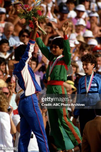 Los Angeles, CA Judi Brown, Nawal El Moutawakel, Cristieana Cojocaru, Women's Track 400 metres hurdles medal ceremony, Memorial Coliseum, at the 1984...