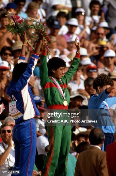 Los Angeles, CA Judi Brown, Nawal El Moutawakel, Cristieana Cojocaru, Women's Track 100 metres medal cermony, Memorial Coliseum, at the 1984 Summer...