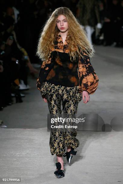 Model walks the runway at the Marques'Almeida show during London Fashion Week February 2018 on February 19, 2018 in London, England.