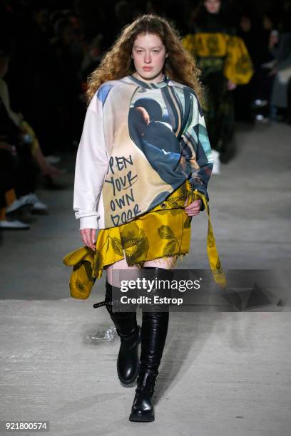 Model walks the runway at the Marques'Almeida show during London Fashion Week February 2018 on February 19, 2018 in London, England.