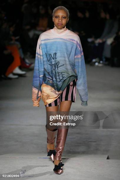 Model walks the runway at the Marques'Almeida show during London Fashion Week February 2018 on February 19, 2018 in London, England.