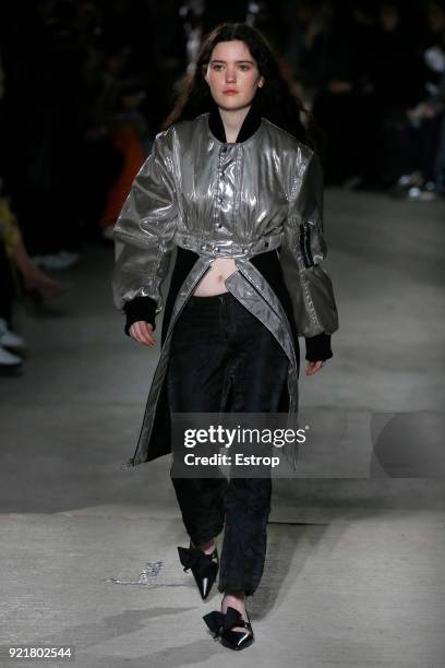 Model walks the runway at the Marques'Almeida show during London Fashion Week February 2018 on February 19, 2018 in London, England.