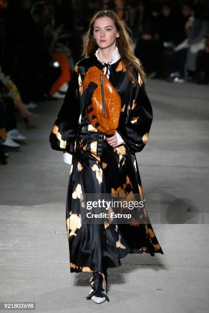 Model walks the runway at the Marques'Almeida show during London Fashion Week February 2018 on February 19, 2018 in London, England.