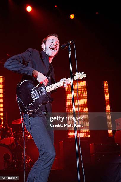 Tom Smith of Editors performs at Hammersmith Apollo, London on October 21, 2009 in London, England.