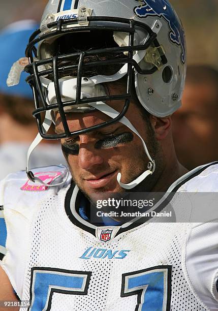 Dominic Raiola of the Detroit Lions walks the bench area during a game against the Green Bay Packers at Lambeau Field on October 18, 2009 in Green...