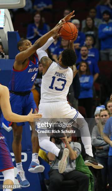 Myles Powell of the Seton Hall Pirates attempts a shot as Brandon Cyrus of the DePaul Blue Demons defends during the first half of a game at...