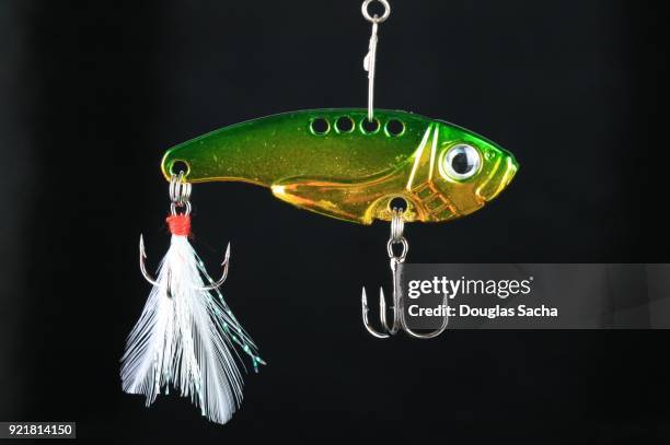 colorful crank bait on a black background - vishaak visgerei stockfoto's en -beelden