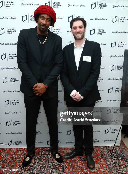 Basketball player Amar'e Stoudemire and VP of Sales & Marketing for the Israeli Wine Producers Association, Joshua Greenstein pose for photos during...