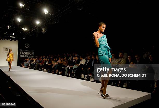 Model displays a creation by Mexican designer Blanca Estela Sanchez during the Mercedes Benz Fashion Week in Mexico City on October 21, 2009. AFP...