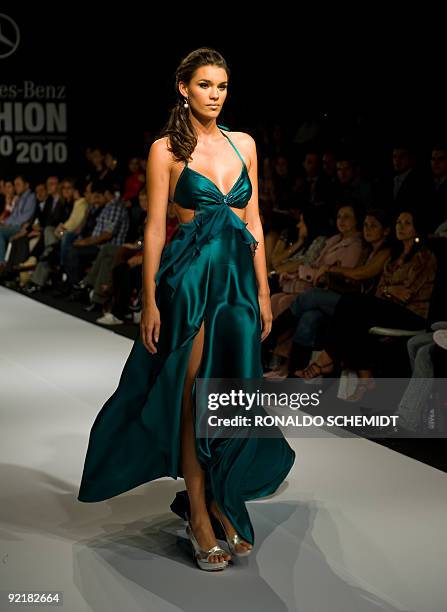 Model displays a creation by Mexican designer Blanca Estela Sanchez during the Mercedes Benz Fashion Week in Mexico City on October 21, 2009. AFP...