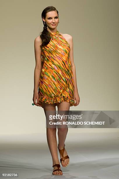 Model displays a creation by Mexican designer Blanca Estela Sanchez during the Mercedes Benz Fashion Week in Mexico City on October 21, 2009. AFP...