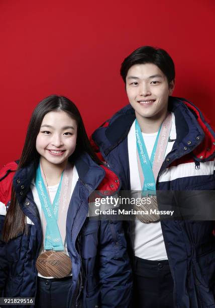 United States Figure skaters and siblings Maia Shibutani and older brother Alex Shibutani pose for a portrait with their bronze medals, one for the...