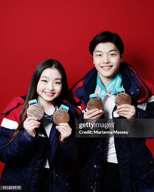 United States Figure skaters and siblings Maia Shibutani and older brother Alex Shibutani pose for a portrait with their bronze medals, one for the...