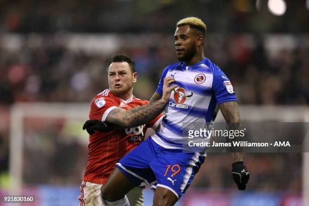 Lee Tomlin of Nottingham Forest and Leandro Bacuna of Reading during the Sky Bet Championship match between Nottingham Forest and Reading at City...