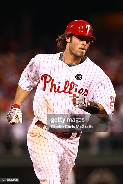 Jayson Werth of the Philadelphia Phillies rounds the bases after his seventh inning home run against the Los Angeles Dodgers in Game Five of the NLCS...