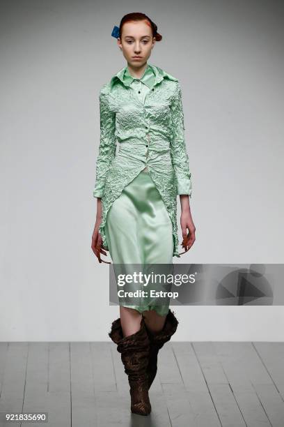 Model walks the runway at the Faustine Steinmetz show during London Fashion Week February 2018 at BFC Show Space on February 19, 2018 in London,...