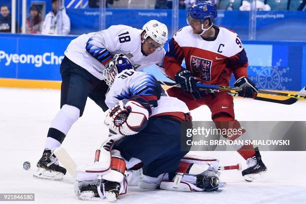 S Jordan Greenway , USA's Ryan Zapolski and Czech Republic's Martin Erat fight for a puck during the men's quarterfinals playoffs ice hockey match...