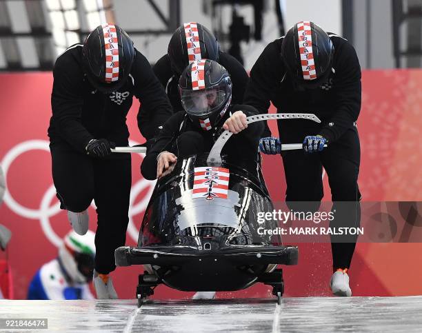 Pilot Drazen Silic of Croatia leads his team at the start of the 4-man bobsleigh training session during the Pyeongchang 2018 Winter Olympic Games,...