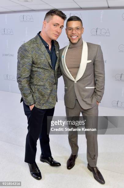 Actors Colton Haynes and Wilson Cruz attend the Costume Designers Guild Awards at The Beverly Hilton Hotel on February 20, 2018 in Beverly Hills,...