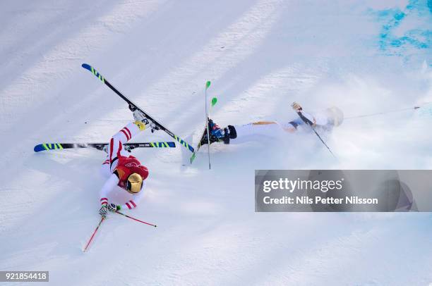 Christoph Wahrstoetter of Austria and Erik Mobaerg of Sweden crashes during the Mens Skicross Finals at Phoenix Snow Park on February 21, 2018 in...