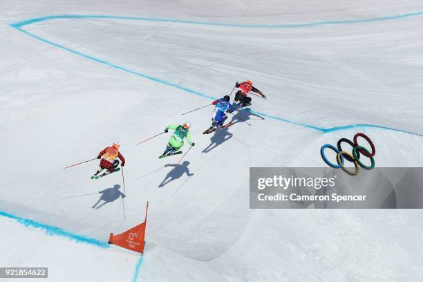 Armin Niederer of Switzerland, Aenaud Bovolenta of France, Filip Flisar of Slovenia and Dave Duncan of Canada compete in the Freestyle Skiing Men's...