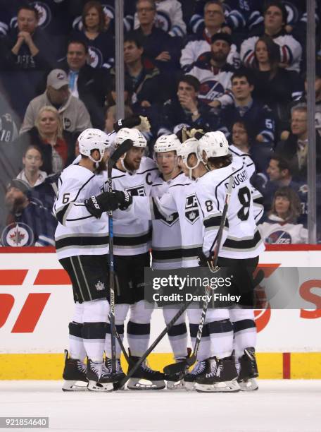 Jake Muzzin, Anze Kopitar, Tyler Toffoli, Dustin Brown and Drew Doughty of the Los Angeles Kings celebrate a third period goal against the Winnipeg...