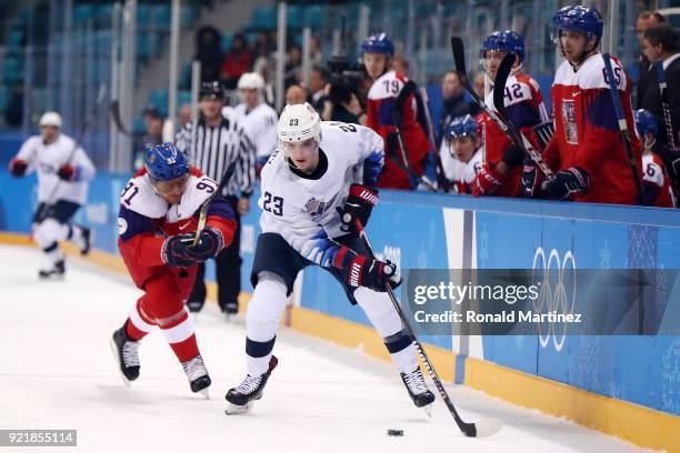 Troy Terry of the United States skates against Martin Erat of the Czech Republic in the first period during the Men's Play-offs Quarterfinals on day...