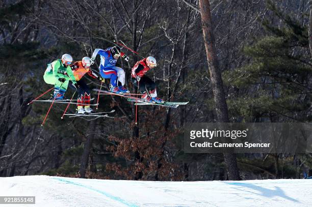 Armin Niederer of Switzerland, Aenaud Bovolenta of France, Filip Flisar of Slovenia and Dave Duncan of Canada compete in the Freestyle Skiing Men's...