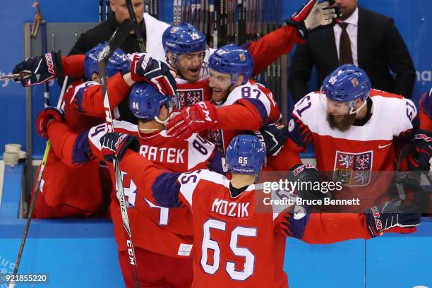 Tomas Kundratek of the Czech Republic celebrates after scoring a goal against the United States in the second period during the Men's Play-offs...