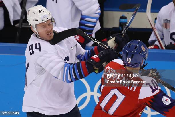 Roman Cervenka of the Czech Republic is called for a penalty against Ryan Stoa of the United States in the third period during the Men's Play-offs...