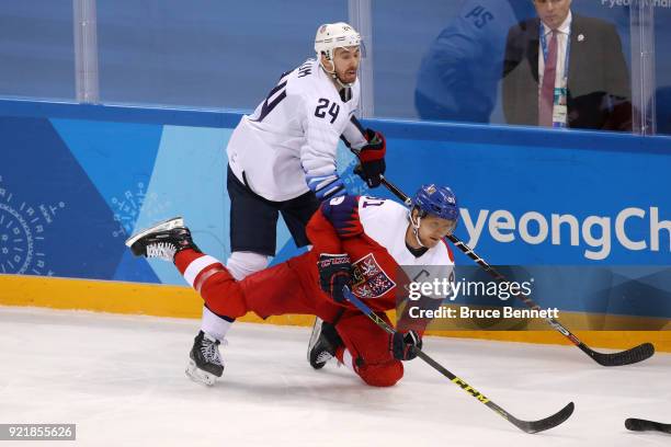 Martin Erat of the Czech Republic collides with Jonathon Blum of the United States in the third period during the Men's Play-offs Quarterfinals on...