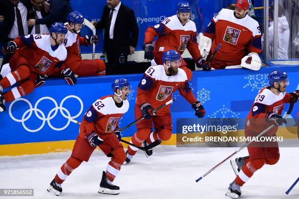 Team Czech Republic clebrates after winning the men's quarterfinals playoffs ice hockey match between Czech Republic the United States during the...