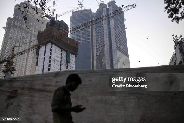 The two towers of Trump Tower Mumbai, center, stand under construction at Lodha The Park, a luxury residential project developed by Lodha Developers...