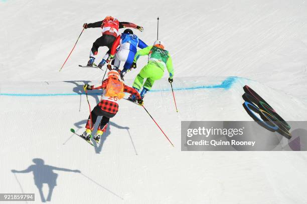 Armin Niederer of Switzerland, Aenaud Bovolenta of France, Filip Flisar of Slovenia and Dave Duncan of Canada compete in the Freestyle Skiing Men's...