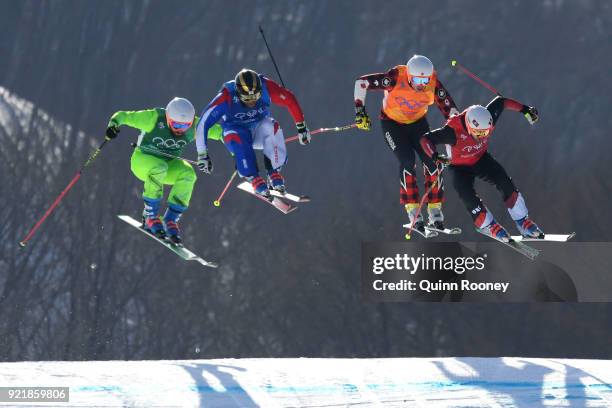 Armin Niederer of Switzerland, Aenaud Bovolenta of France, Filip Flisar of Slovenia and Dave Duncan of Canada compete in the Freestyle Skiing Men's...