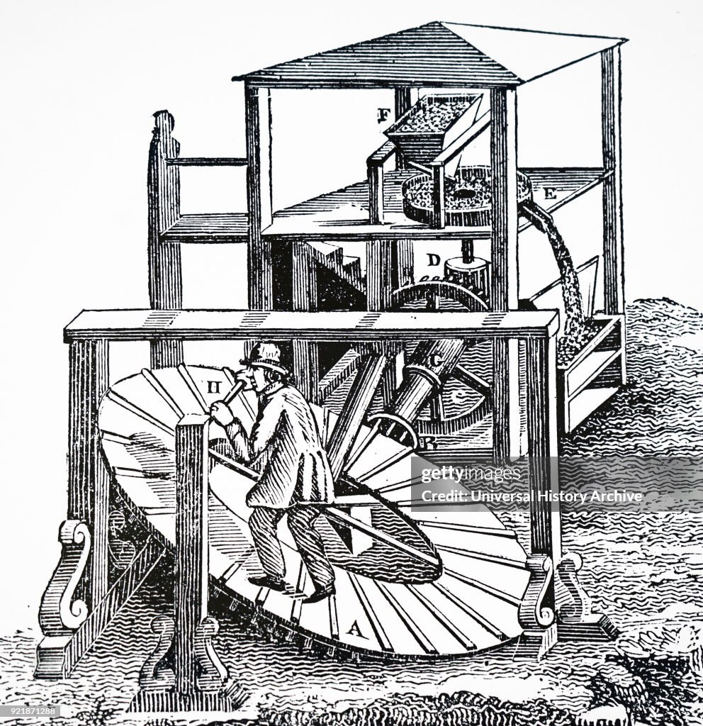A man working an inclined tread wheel.