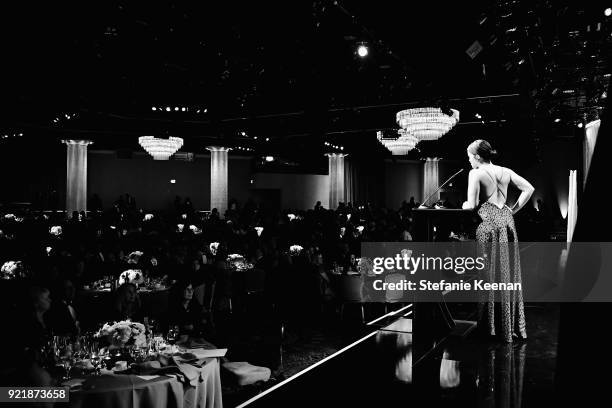 Host Gina Rodriguez speaks onstage at the Costume Designers Guild Awards at The Beverly Hilton Hotel on February 20, 2018 in Beverly Hills,...