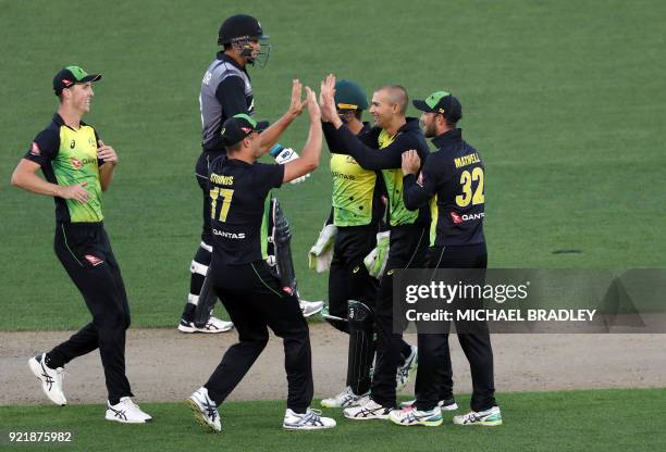 Australia's Ashton Agar celebrates after taking the wicket of New Zealand's Mark Chapman during the final Twenty20 Tri Series international cricket...