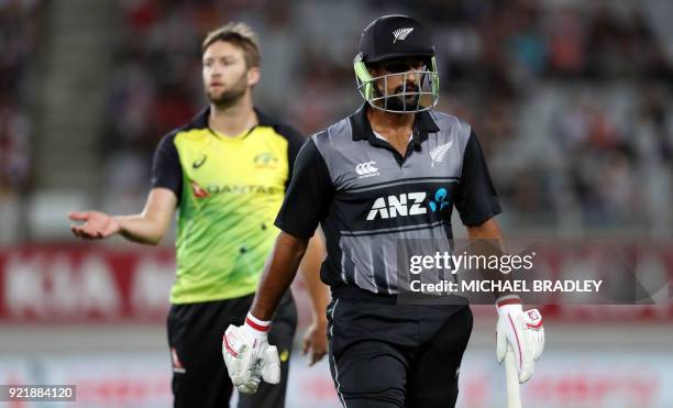 New Zealand's Ish Sodhi walks off after being dismissed by Australia's Andrew Tye during the final Twenty20 Tri Series international cricket match...