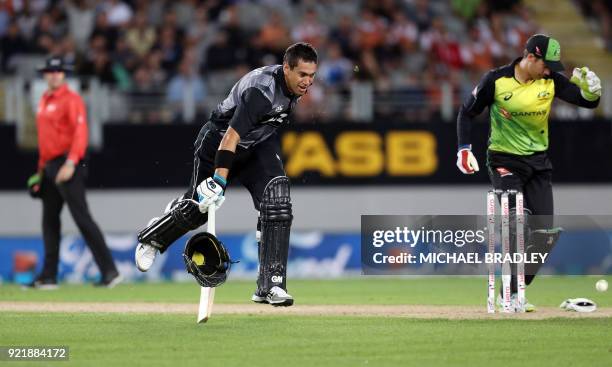 The helmet of New Zealand's Ross Taylor comes off as he makes a run during the final Twenty20 Tri Series international cricket match between New...